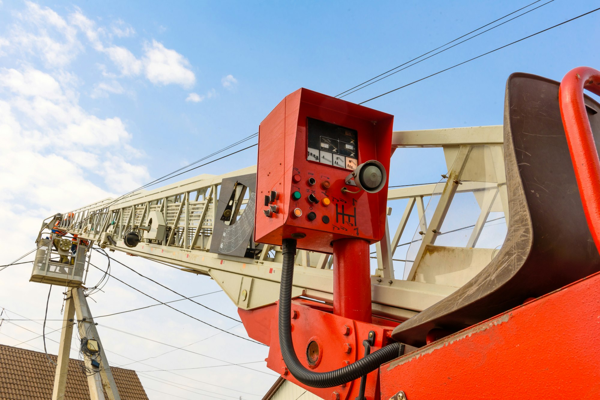 Hydraulic equipment of lifting crane with boom and basket for workers