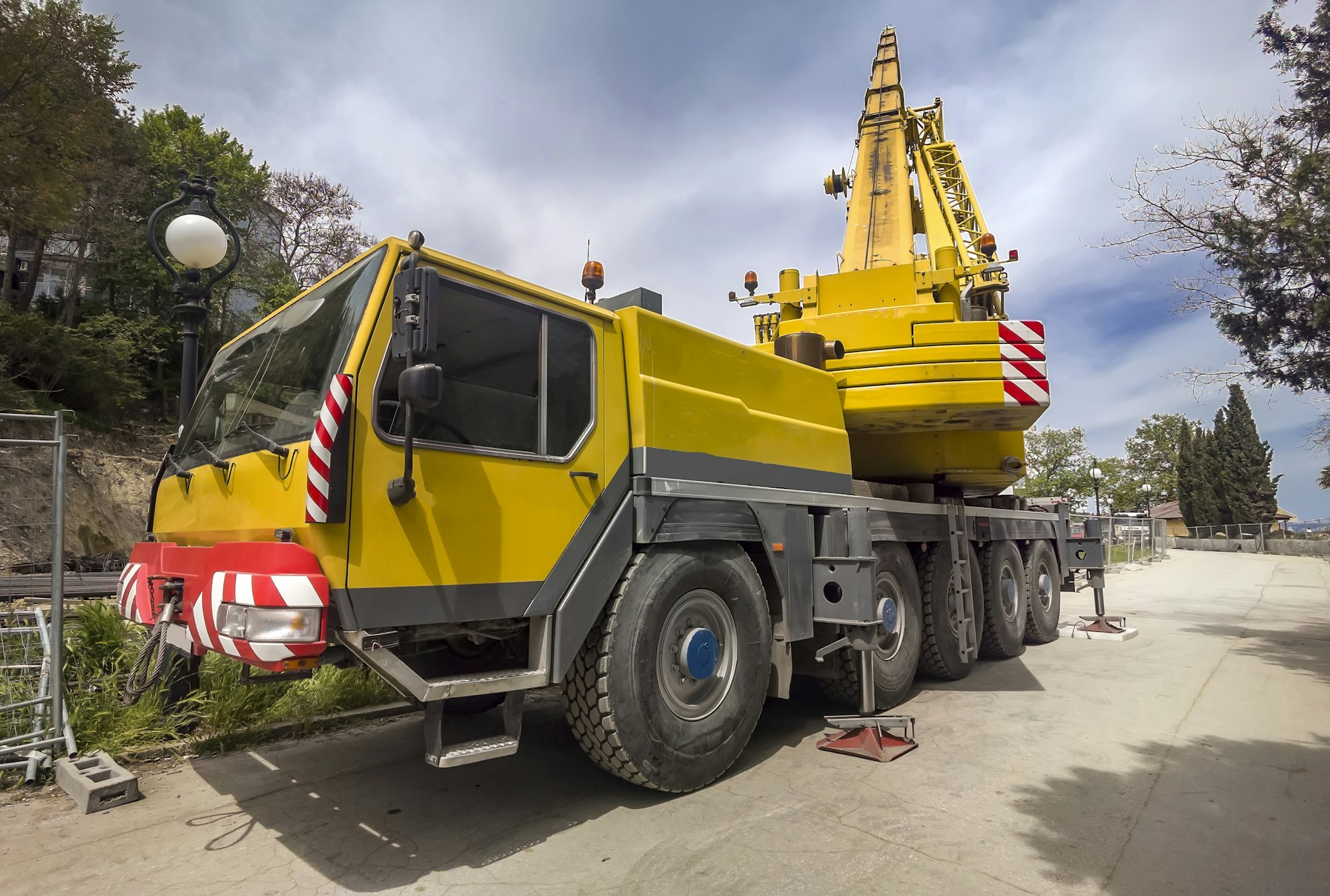 Mobile crane at construction site heavy truck big